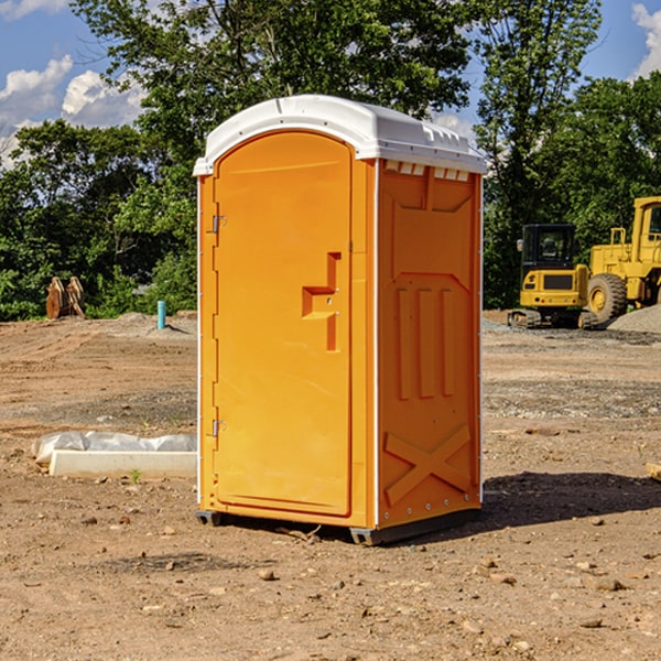 what is the cost difference between standard and deluxe portable restroom rentals in Woodside East DE